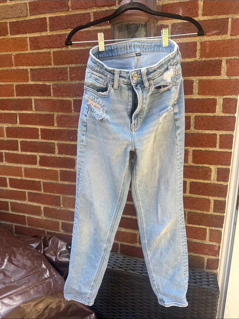 American Eagle Outfitters Light Blue High-Rise Distressed Mom Jeans